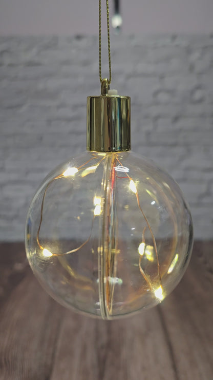 ❄️ Boule de Noël lumineuse à DEL en acrylique – Dino festif 🎄🦖